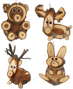 four wooden ornaments depicting animals hanging from strings