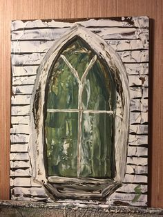 a painting of an old window on a brick wall