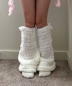 a woman's legs wearing white crocheted socks