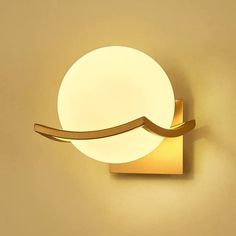 a light that is on the side of a wall with a wave coming out of it