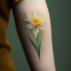 a yellow and white flower on the arm