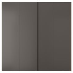 an open gray wall with three vertical panels