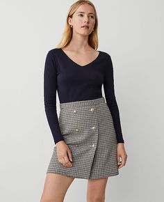 Styled with a polished button front, our wrap A-line skirt is a luxe love. Button front. Hidden back zipper with hook-and-eye closure. Lined.,Hit:Hits above the knee,Imported:Imported,Length:17 1/2" long,Fabrication:Shell: 50% Polyester, 40% Wool, 10% Other Fibers; Lining: 100% Polyester,Garment Care:Dry Clean Only Petite Brushed Check Button Wrap A-Line Skirt by Ann Taylor Size petite - 00 Sahara Women's A-Line, Skirts, Shell 50%, Polyester, 40%, Wool, 10%, Other, Fibers Lining 100%, Polyester, Dry, Clean, Only Ann Taylor Petite, Knitted Suit, Trendy Clothes For Women, Petite Fashion, Skirts For Sale, Cotton Style, Above The Knee, A Line Skirt, A Line Skirts