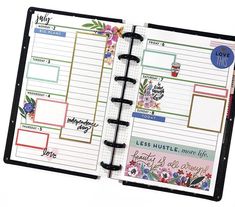 an open planner book with flowers on it