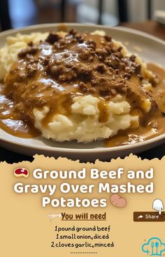 a white plate topped with mashed potatoes covered in gravy and ground beef