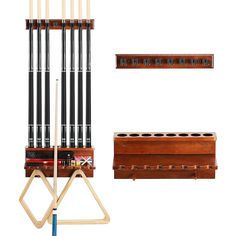 a pool cue rack with eight cues and two wooden boxes on it's sides