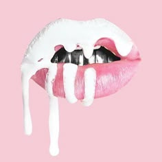 a woman's lips with white icing on them and dripping from the tongue