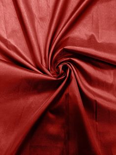 the red fabric is very soft and shiny