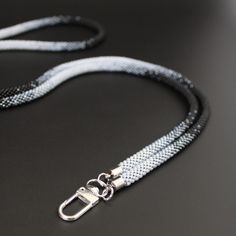 Black beaded lanyard for men, teacher gift, Medical lanyard for badge holder. This crochet beaded jewelry can be the perfect gift for your husband, coworkers, boyfriend, teacher. ATTENTION * I have worked out the product packaging , so it will come to you without damage, otherwise you can return it PRODUCT SPECIFICATIONS *SIZE:           Lanyard length : 71 cm - 27.5 inc; 91 cm - 36 inc; 115 cm - 45.3 inc           Lenght with holder: 38 cm - 15 inc; 51 cm - 20 inc; 61 cm - 24 inc * At the ends of the product, metal fittings are stainless steel, will not darken with time. * ! Please be careful with this necklace. Jewelry should be kept out of the reach of children and Pets. Contact with water, fire, cosmetics and perfumes should be avoided. ! Best wishes by Lera Crochet Beaded Jewelry, Chain Ideas, Beaded Lanyard, Beaded Lanyards, Badge Holder, Product Packaging, Badge Holders, Black Beads, Teacher Gift