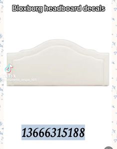 a white headboard with flowers on it and the numbers below it are in english