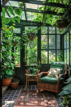 a room filled with lots of green plants and potted plants on top of it