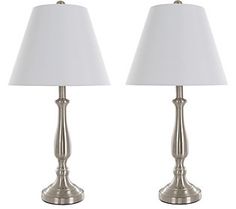 a pair of lamps sitting next to each other