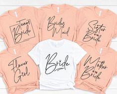 six bridesmaid shirts in pink and white with the words mother of the bride on them