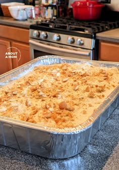 a pan filled with food sitting on top of a counter