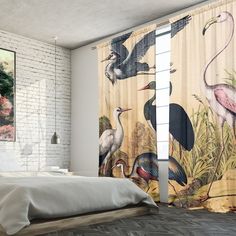 a room with a bed, curtains and birds on the wall in front of it