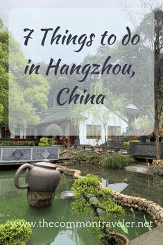 a teapot sitting on top of a pond with the words things to do in hangzhou