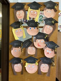 a door decorated with paper plates and graduation caps