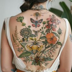 Back Tattoos For Women Tattoo Master Files Back Patch Work Tattoo Women, Healed Color Tattoo, Women Back Tattoos Full, Wildflower Back Tattoo, Garden Tattoo Ideas, Back Tattoos For Women, Mario Tattoo, Women Tattoos, Mushroom Tattoos