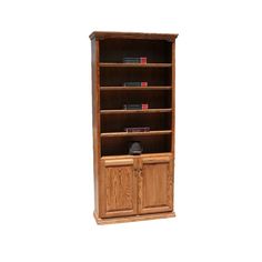 a wooden bookcase with several books on it's sides and two doors open