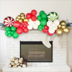 a fireplace decorated for christmas with balloons and candy canes