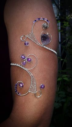 Amethyst heart Arm cuff,  Silver Wire Wrap Spiral Arm band, Arm cuff bracelet If you want to change the usual look, it's simple, put a upper arm bracelet! The  upper arm bracelet is an original jewelry. These handcrafted bracelet were made with Amethyst heart, silver plated wire and feature a sparkly Czech glass beads. The upper arm bracelet is universal: in any fullness will look perfect. He does not press and pulls your hand. You go all day and not to think about it - it is so comfortable. To Handmade Adjustable Purple Cuff Bracelet, Purple Cuff Bangle Bracelet As Gift, Unique Purple Cuff Bracelet As Gift, Unique Purple Cuff Bracelet For Gift, Unique Purple Bangle Cuff Bracelet, Purple Wire Wrapped Bangle Jewelry, Amethyst Cuff Bracelet As Gift, Amethyst Cuff Bracelet In Purple For Gift, Purple Amethyst Cuff Bracelet Gift