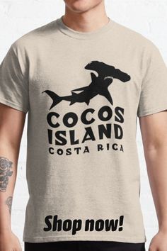 a man wearing a t - shirt that says cocos island costa rica shop now