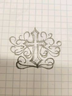 a drawing of a cross on a piece of paper