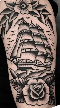 a black and white image of a ship with roses on it's side arm