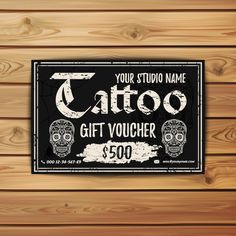 a tattoo gift voucher with skulls on it and the words, your studio name