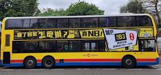 a double decker bus is parked on the street