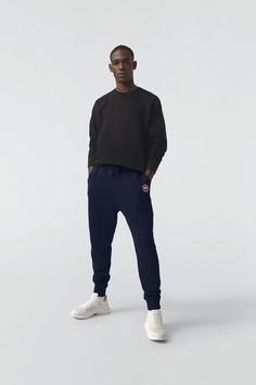 Made with 100% Cotton for breathability and comfort, the Huron Pant has a rib-knit waist and cuffs for a tailored fit and a zippered back pocket. Casual Bottoms With Ribbed Cuffs And Straight Hem, Casual Pants With Ribbed Cuffs And Straight Hem, Casual Pants With Ribbed Cuffs And Tapered Leg, Relaxed Fit Workwear Pants With Ribbed Cuffs, Relaxed Fit Pants With Ribbed Cuffs For Work, Athleisure Straight Leg Bottoms With Ribbed Cuffs, Sporty Straight Leg Joggers With Ribbed Cuffs, Relaxed Fit Bottoms With Ribbed Cuffs For Work, Sporty Pants With Ribbed Cuffs For Work