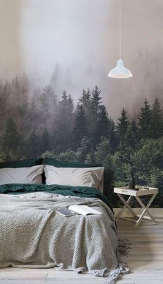 a bedroom with a bed, table and chair in front of a wall mural that reads our soft line @ cosymix