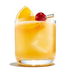 an orange cocktail garnished with a cherry