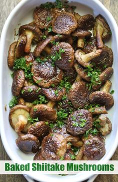 baked shiitake mushrooms with parsley in a white dish