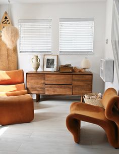 a living room scene with focus on the dresser