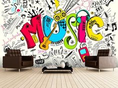 a room with two couches and a wall mural that says music on the side