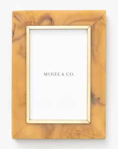 a marble frame with the word mcgee & co on it