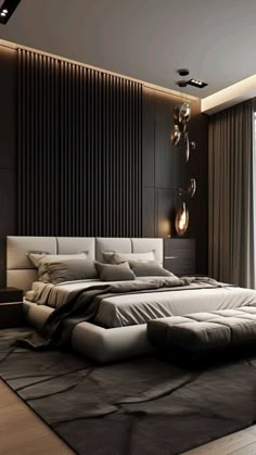 a large bed sitting in the middle of a bedroom next to a wall mounted light