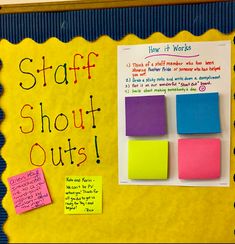 a bulletin board with sticky notes on it