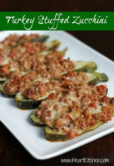 turkey stuffed zucchini on a white plate