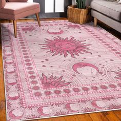 a living room with a purple rug on the floor