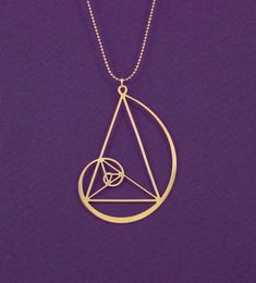 Spiral Golden ratio Necklace – Galartsy Golden Ratio Necklace, Fibonacci Golden Ratio, Diy Bangle Bracelets, Golden Spiral, Fibonacci Spiral, Spiral Necklace, Accesories Jewelry, Golden Triangle, Triangle Necklace