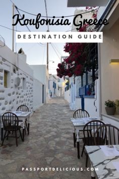 an alley way with tables and chairs next to a building that says, california greek destination guide