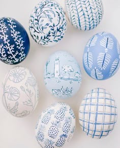 an instagram page with blue and white painted eggs