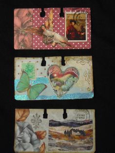 three tags with different pictures on them and one has a heart shaped butterfly in the middle