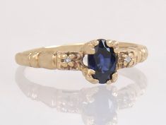 ~ Featured for sale here is an estate antique Art Deco genuine sapphire diamond 10K yellow gold ring! ~ The centerpiece of this beautiful Art Deco piece is a .60ct oval genuine blue sapphire gemstone! There are 2 genuine diamonds set in the shoulders for that added sparkle, the perfect accent to this lovely center sapphire.  ~ This piece is in excellent condition for its age! The stone has some minor nicking only visible under magnification. ~ Made from solid hallmarked 10K yellow gold. Ring mea Antique Oval Sapphire Ring With Diamond Accents, Vintage Blue Sapphire Ring With Diamond Accents, Vintage 14k Gold Sapphire Birthstone Ring, Vintage Oval Sapphire Birthstone Ring, Vintage Oval Sapphire Ring As Birthstone, Vintage Sapphire Rings With Diamond Accents, Vintage 14k Gold Sapphire Ring With Prong Setting, Vintage 14k Gold Sapphire Ring With Rose Cut Diamonds, Vintage Sapphire Gemstone Ring