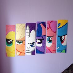 the wall is decorated with colorful pictures of princesses and pony ponies on it