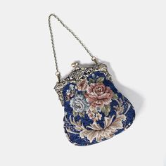 Introducing our captivating collection of Chatelaine purses, inspired by the elegance of the Victorian era.Available in three sizes—Large, Medium, and Small—these purses offer versatility and style. The Large and Medium sizes can be used as both a clutch and a crossbody purse, as we provide two chains for each size: 50" and 13" in length. This allows you to effortlessly switch between crossbody and clutch styles.Let's focus on the Chatelaine Large Crossbody Purse:With a frame width of 6.25" and Elegant Floral Embroidered Top Handle Shoulder Bag, Elegant Top Handle Bag With Floral Print, Vintage Floral Embroidery Formal Bags, Blue Evening Flap Bag With Gold-tone Hardware, Large Crossbody Purse, Blue Vintage Bag With Gold-tone Hardware, Brass Hook, Secret Sale, Chatelaine