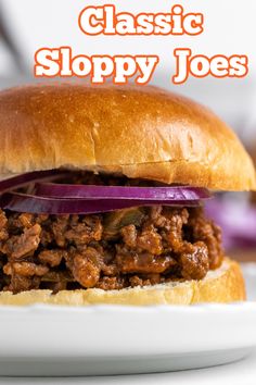 a close up of a sandwich on a plate with the words classic sloppy joes