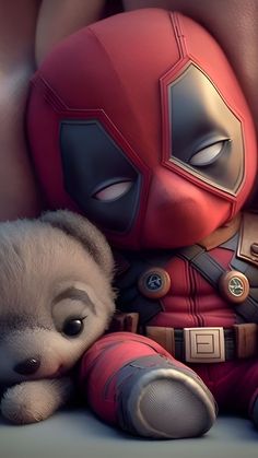 a teddy bear is next to a deadpool character